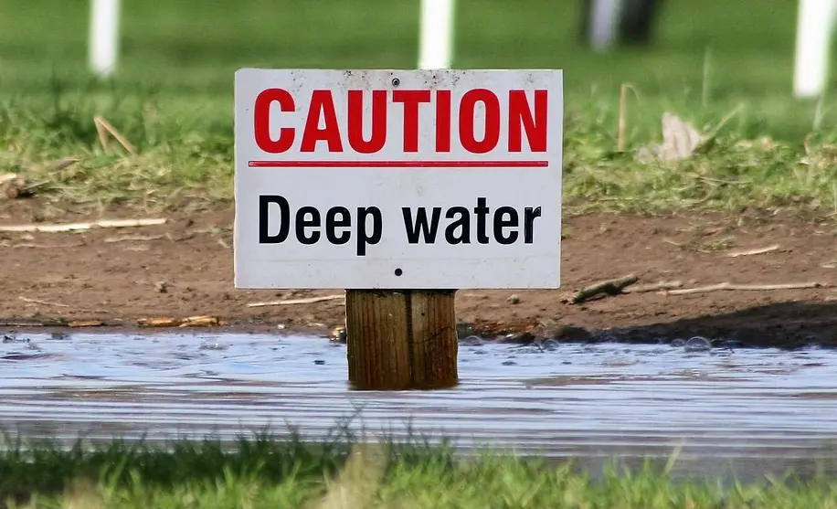 Caution Deep Water Sign for Flooding