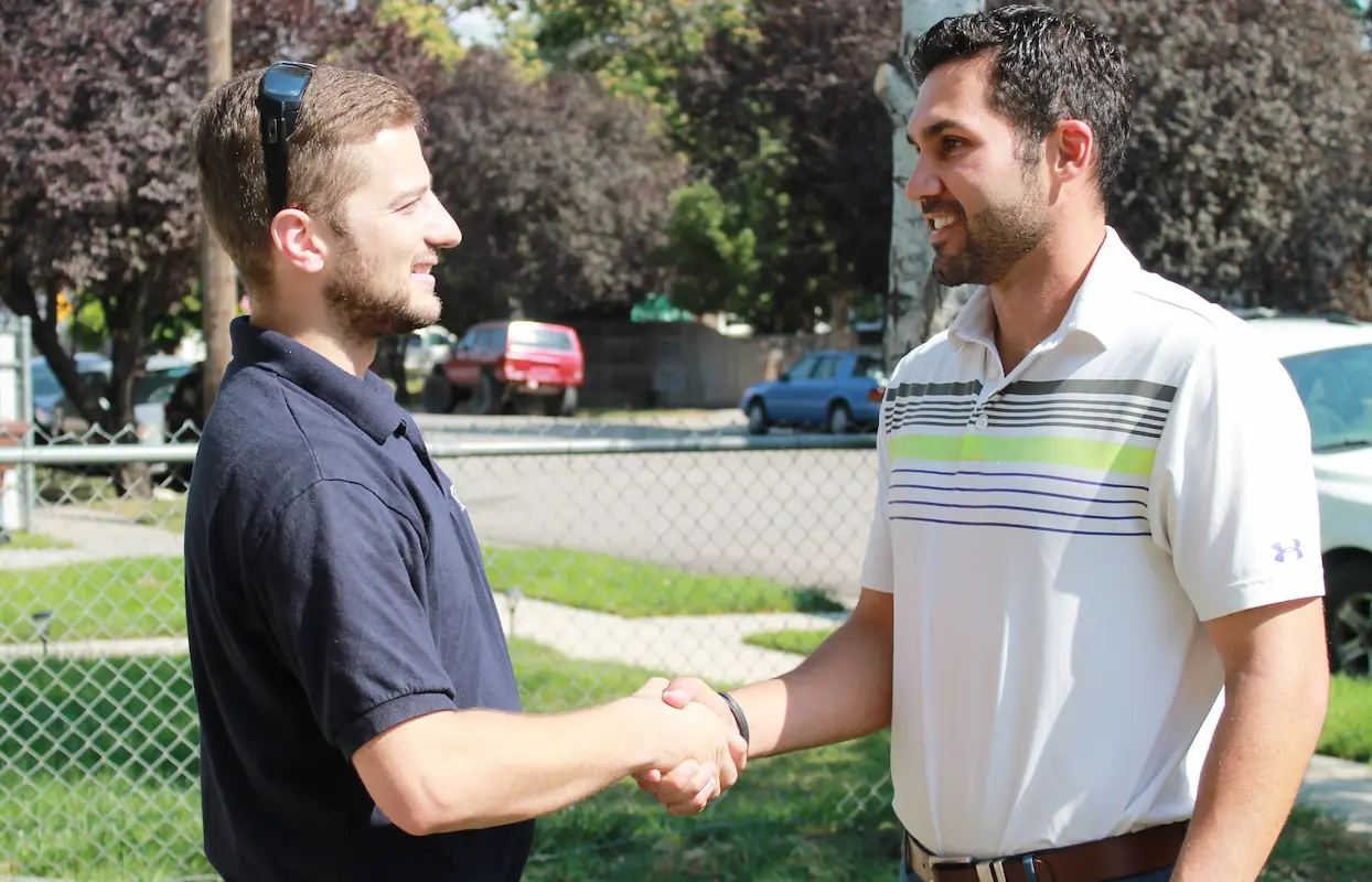 two people shaking hands