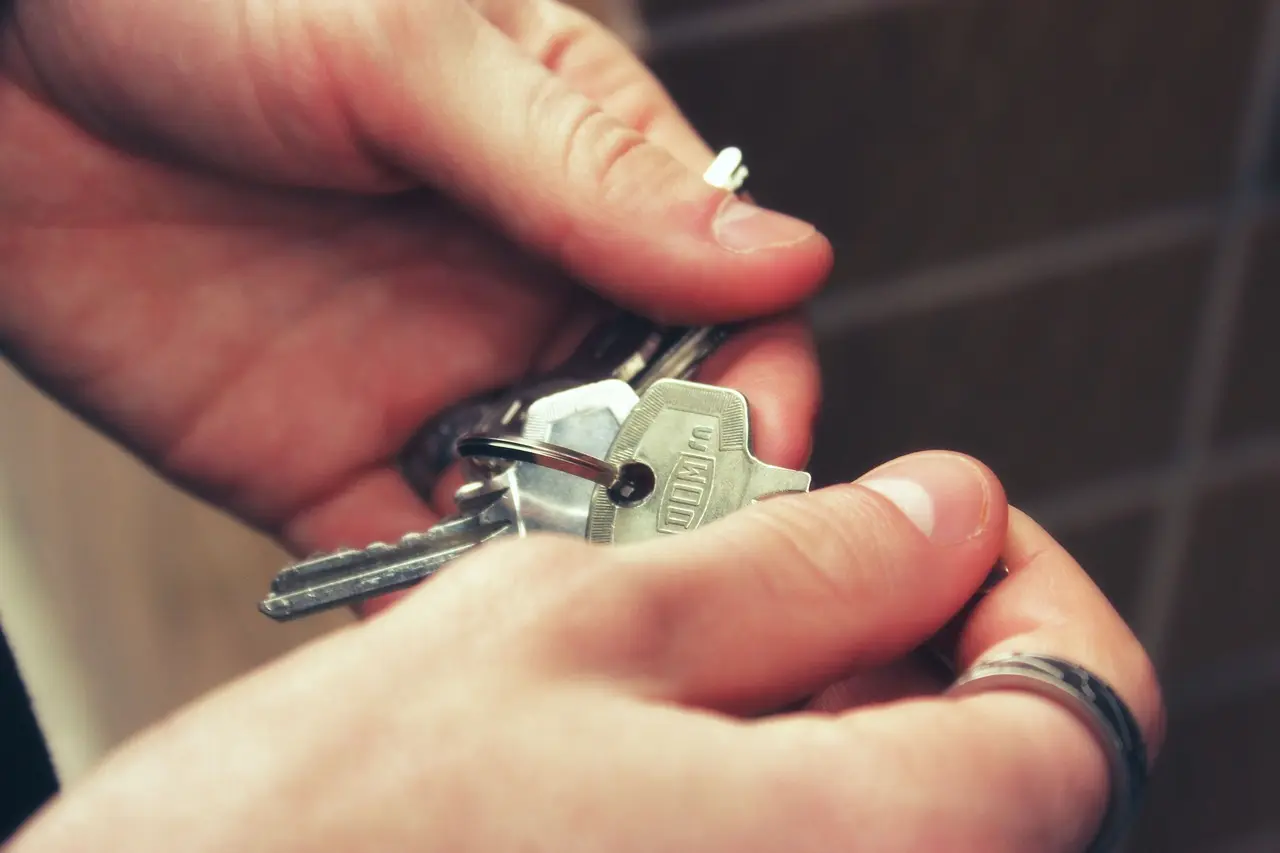 House keys held in hands
