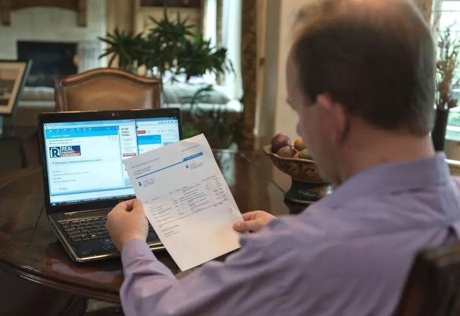 man reading a statement