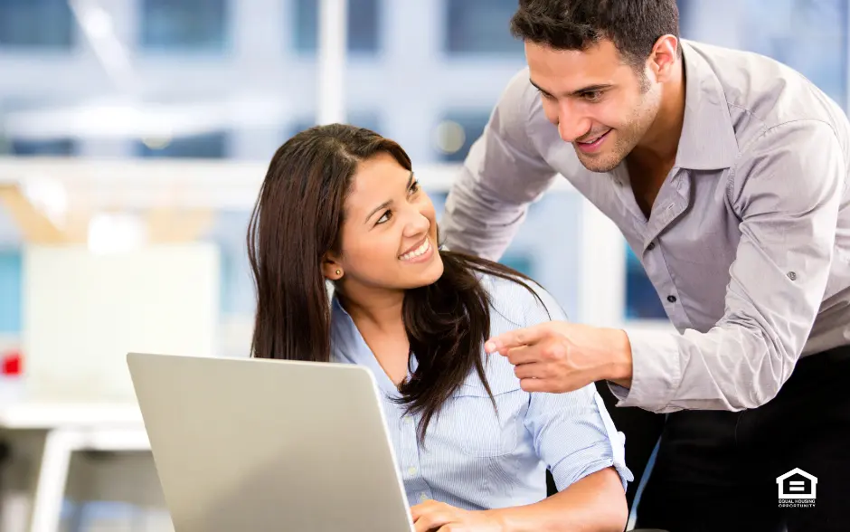 Man and woman with laptop computer