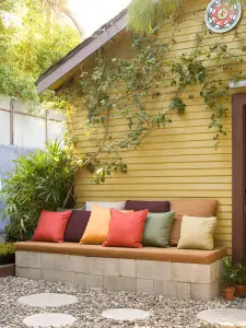 Cinder block bench with pillows