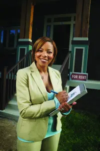 Real estate agent with clipboard