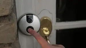 A doorbell being rung